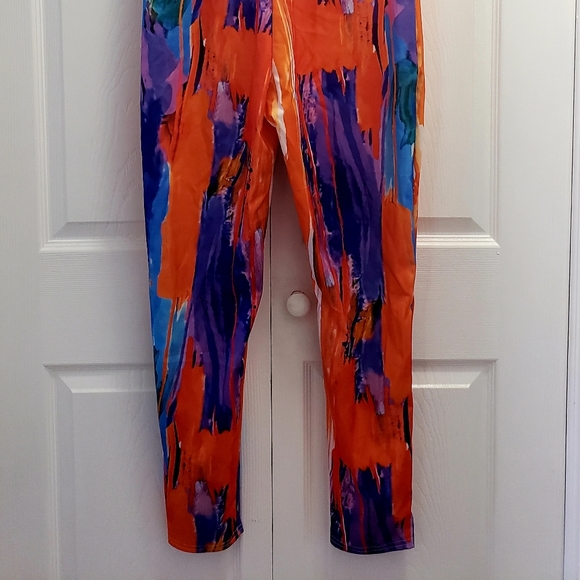 Multi-colored Back Out Jumpsuit. - Picture 1 of 8